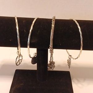 4 Bangles with charms